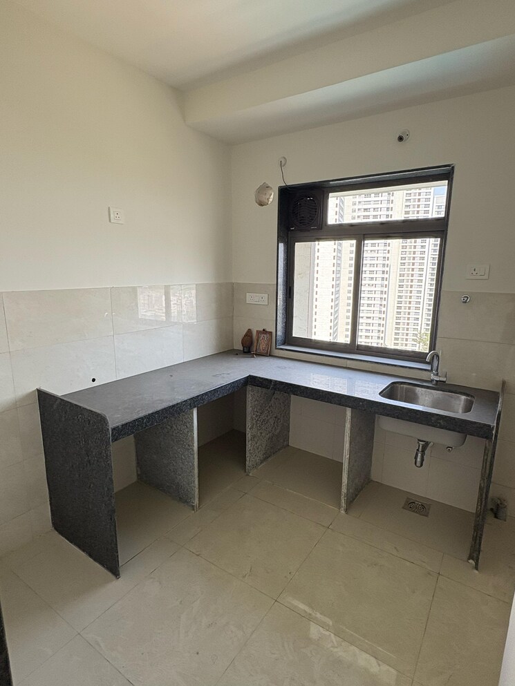 Kitchen, dosti-west-county 2 Bedroom 560 Sq.Ft. Apartment In Balkum Pada Thane 9061085