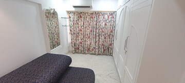 Living Room in 2 BHK Apartment at Versova Heights, Versova – for Rent