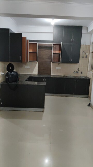 Kitchen in 3 BHK Apartment at SVP Gulmohur Garden, Raj Nagar Extension – for Sale