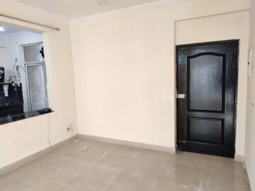 Room in 2.5 BHK Apartment at Paramount Symphony, Sain Vihar – for Sale