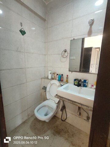 Bathroom in 2 BHK Apartment at Lake avenue CHS, Powai – for Rent