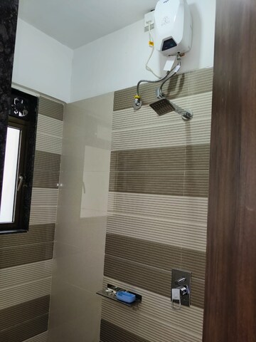 Bathroom in 1 BHK Apartment at Poonam Vaishno Heights, Malad East – for Rent
