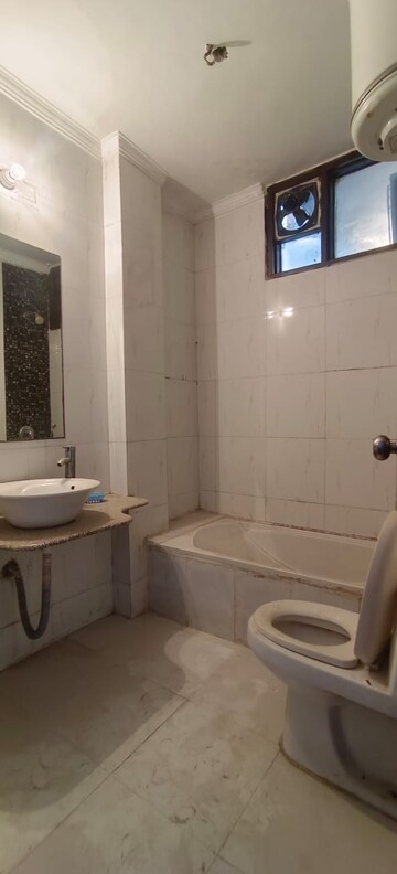 Bathroom in 3 BHK Builder Floor at Freedom Fighters Enclave – for Rent