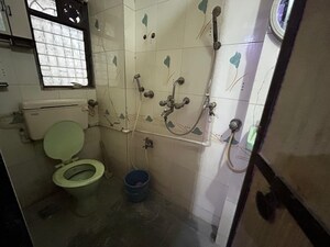 Bathroom in 1 BHK Apartment at Shreekar Krupa CHS, Dombivli West – for Sale
