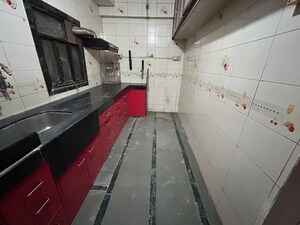 Kitchen in 1 BHK Apartment at Shreekar Krupa CHS, Dombivli West – for Sale