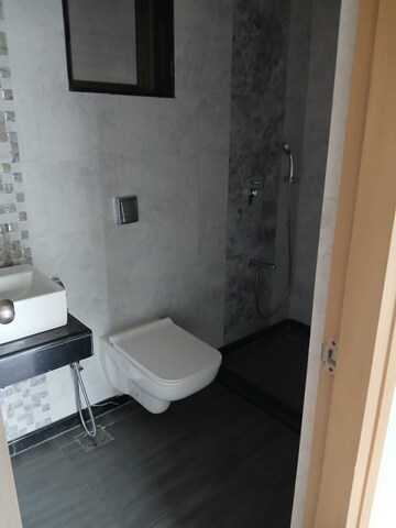Bathroom in 2 BHK Apartment at Raj Infinia, Malad West – for Rent