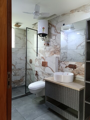 Bathroom in 4 BHK Builder Floor at Agcr Enclave – for Rent