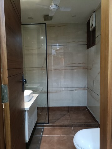 Bathroom in 4 BHK Builder Floor at Agcr Enclave – for Rent