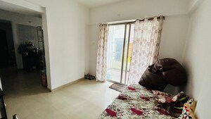 Living Room in 1 BHK Apartment at Alpine Aura, Moshi – for Rent