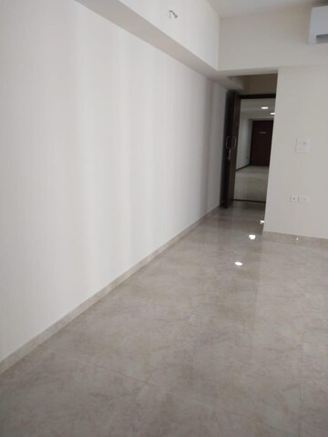 Living Room in 1.5 BHK Apartment at Lodha Amara, Kolshet Road – for Sale