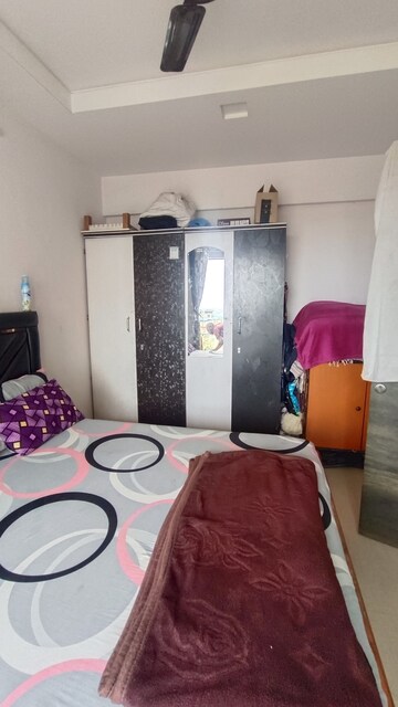 Bedroom in 1 BHK Apartment at Amber Enclave, Thakurli – for Sale