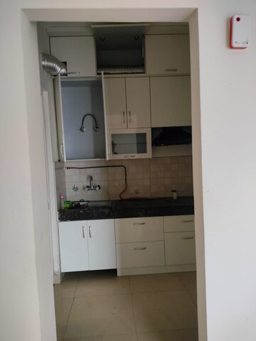 Kitchen in 2 BHK Apartment at Ashiana Green, Ahinsa Khand 2 – for Sale