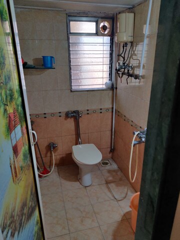 Bathroom in 2 BHK Apartment at Gemstar Nazarene Apartments, Malad West – for Rent