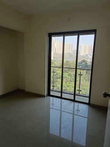 Room in 2 BHK Apartment at KM Horizon Flora, Ghodbunder Road – for Sale