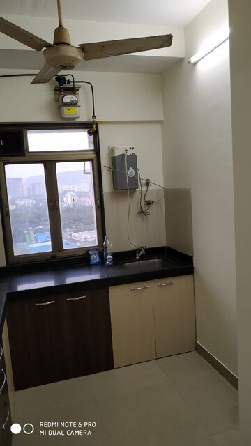 Kitchen in 1.5 BHK Apartment at Lodha Amara, Kolshet Road – for Sale