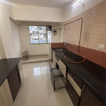 Kitchen in 3 BHK Apartment at Namrata Magic Pimple Saudagar, Pimple Saudagar – for Rent