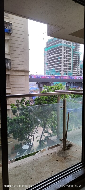 Balcony in 1 BHK Apartment at Raunak Sai Dham Towers, Kandivali West – for Rent