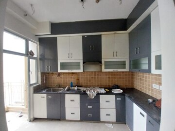 Kitchen in 3 BHK Apartment at Mahagun Mywoods II, Sector 16c Greater Noida – for Rent
