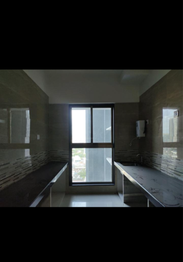 Kitchen in 2 BHK Apartment at Raj Infinia, Evershine Nagar – for Rent