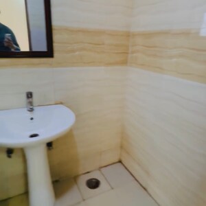 Bathroom in 1 RK Apartment at Supertech Ecociti, Sector 137 – for Rent