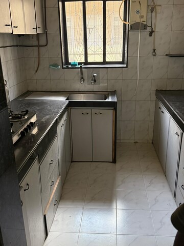 Kitchen in 2 BHK Apartment at Mahim – for Rent