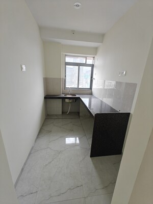Kitchen in 2 BHK Apartment at Grant Road – for Sale