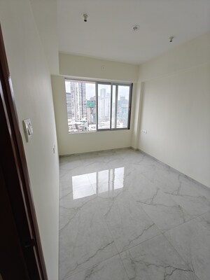 Room in 2 BHK Apartment at Grant Road – for Sale