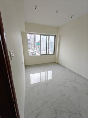 Room in 2 BHK Apartment at Grant Road – for Sale