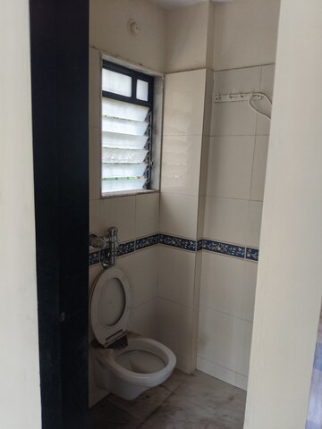 Bathroom in 2 BHK Apartment at Raunak Unnathi Gardens Phase II, Pokhran Road No One – for Sale