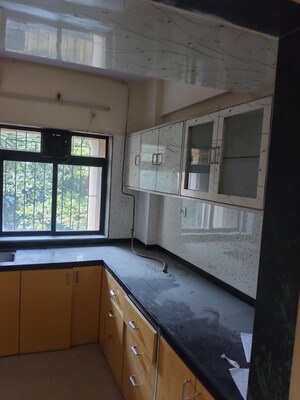 Kitchen in 2 BHK Apartment at Raunak Unnathi Gardens Phase II, Pokhran Road No One – for Sale