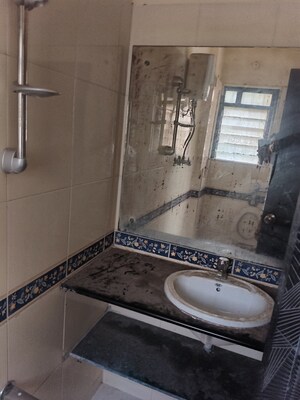 Bathroom in 2 BHK Apartment at Raunak Unnathi Gardens Phase II, Pokhran Road No One – for Sale