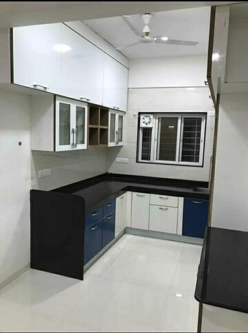 Kitchen in 2.5 BHK Apartment at Kohinoor Viva City, Dhanori – for Rent