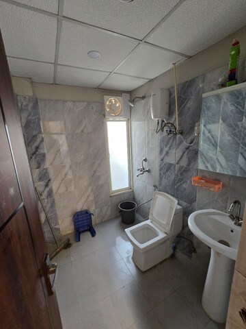 Bathroom in 3 BHK Apartment at Keltech Golf Vista, Dundahera – for Rent