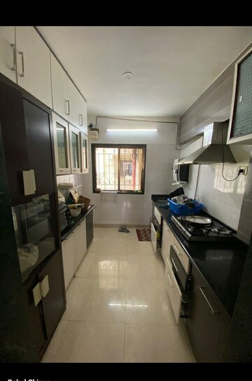 Kitchen in 2 BHK Apartment at Goodwill Nirmiti, Lohgaon – for Rent