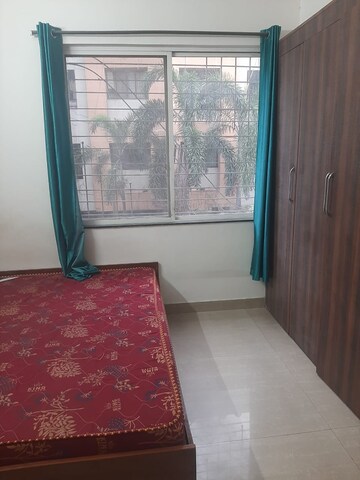 Bedroom in 2 BHK Apartment at Kumar Padmalaya, Aundh – for Rent