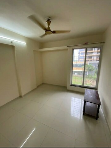 Room in 2 BHK Apartment at Kamdhenu 7th Heaven, Dhanori – for Rent