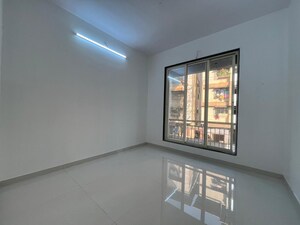 Room in 1 BHK Apartment at Nav Chintamani CHS, Dombivli East – for Sale