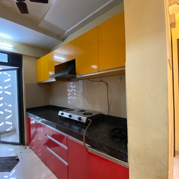 Kitchen in 2 BHK Apartment at Lodha Palava Downtown Dombivli East, Taloja Bypass Road – for Rent