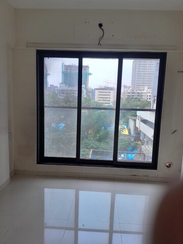Room in 2 BHK Apartment at Pranav Flora Enclave, Borivali East – for Rent
