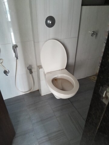 Bathroom in 2 BHK Apartment at Pranav Flora Enclave, Borivali East – for Rent