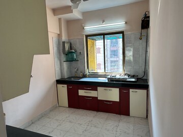 Kitchen in 2 BHK Apartment at Gaurav Gunjan CHS, Kandivali West – for Rent