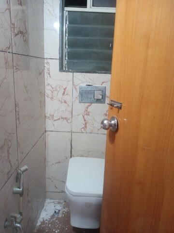 Bathroom in 2 BHK Apartment at RNA N G Silver Spring, Mira Road – for Rent