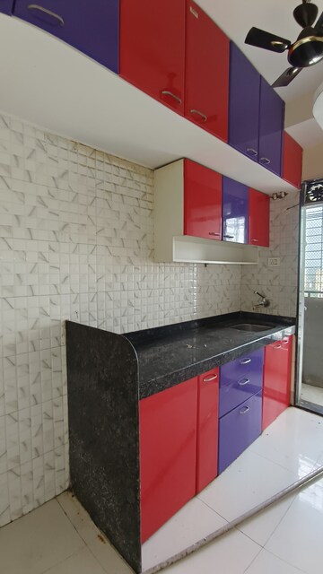 Kitchen in 1 BHK Apartment at Laxmi Annex, Goregaon West – for Sale