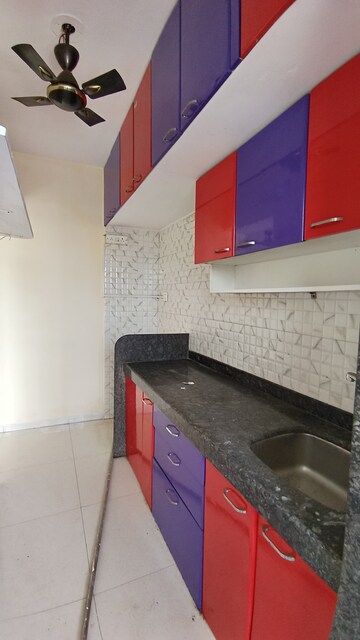 Kitchen in 1 BHK Apartment at Laxmi Annex, Goregaon West – for Sale