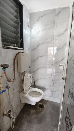 Bathroom in 1 BHK Apartment at Laxmi Annex, Goregaon West – for Sale