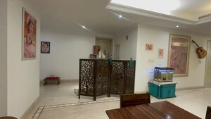 Living Room in 4 BHK Apartment at DLF Queens Court, Greater Kailash ii – for Sale