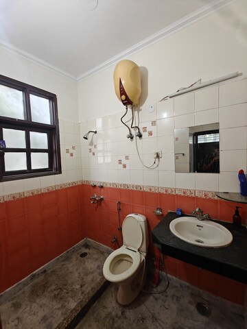 Bathroom in 3 BHK Builder Floor at Sushant Lok I – for Rent