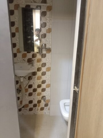Bathroom in 1 BHK Apartment at Om Geetanjali CHS, Dahisar East – for Rent