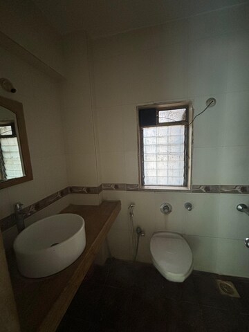 Bathroom in 1 BHK Apartment at Raunak Delight, Owale – for Rent