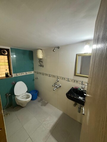 Bathroom in 1 BHK Apartment at Raunak Delight, Owale – for Rent